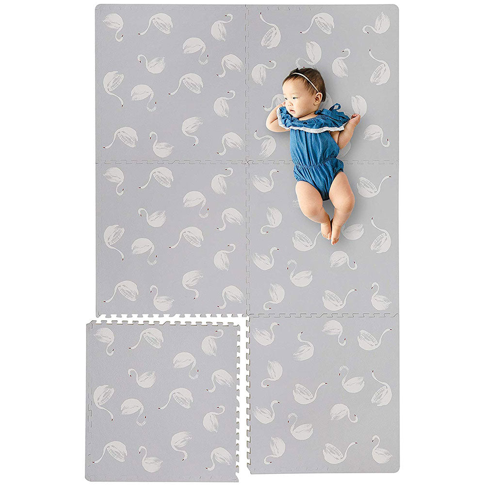 Baby Laying on Swan Grey Foam Mats